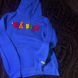 Vibrant Blue Hoodie with Colorful Logo